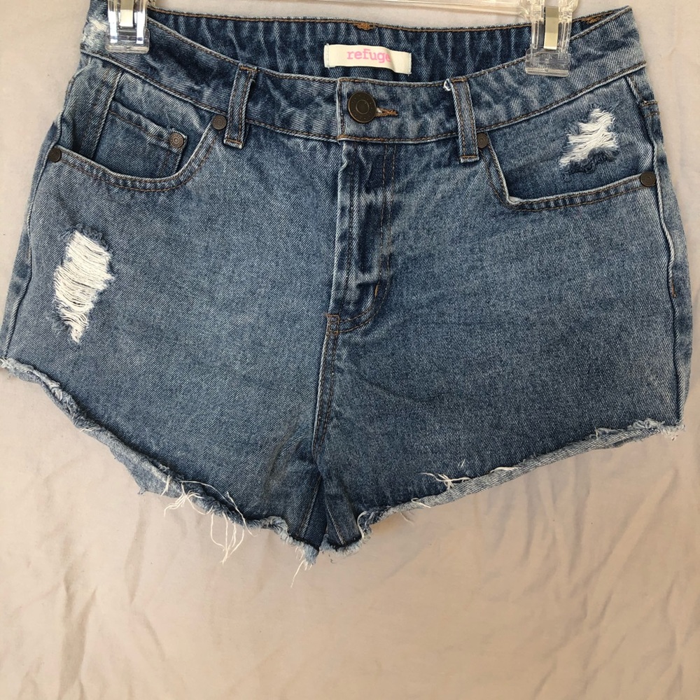 Lightly distressed jean shorts with raw hem